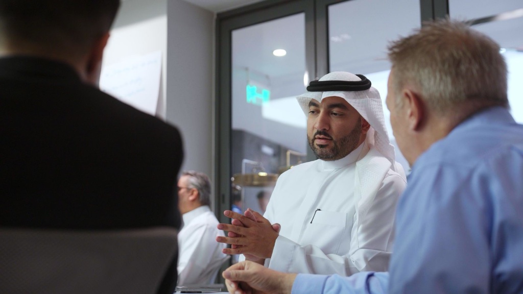 Senior leaders in strategic discussion